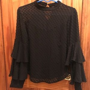 Black sheer plumetis blouse with poet sleeves